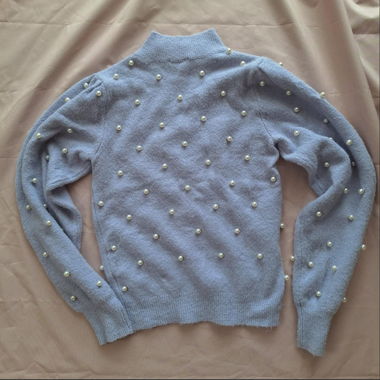 light blue sweater with pearl embelishement detail
