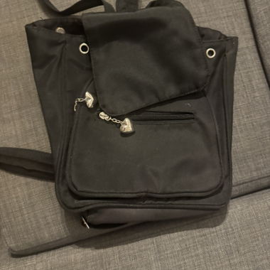 Black backpack with eyelets