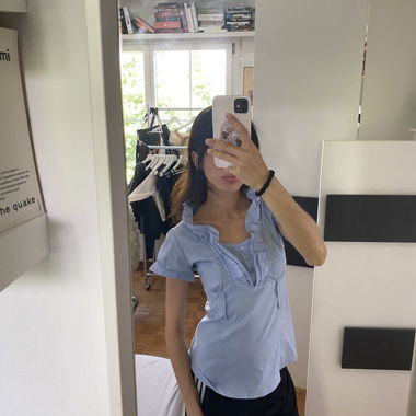 Blouse à col à volants