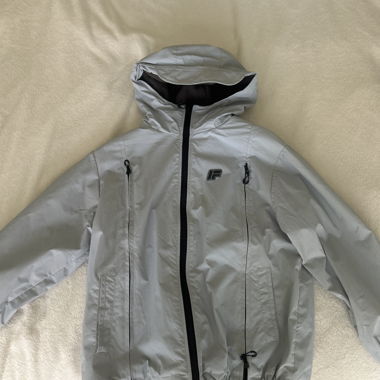 Giacca outdoor azzurra chiara con cappuccio