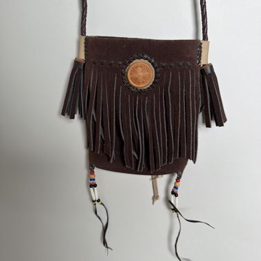 Borsa a sacchetto in pelle con frange