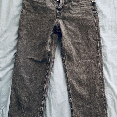 Jeans noirs avec ourlet frangé