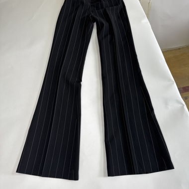 Pantaloni a zampa con righe