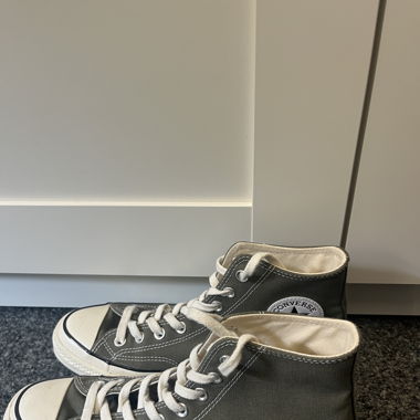 Grüne Converse