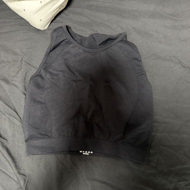 Top de sport noir sans manches