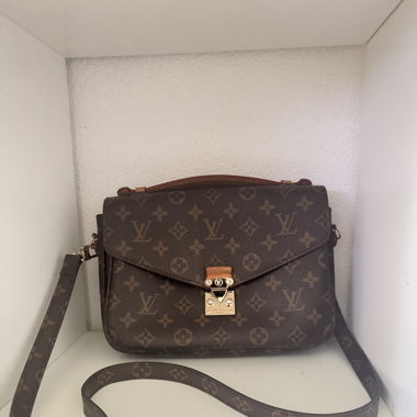 Beau sac à bandoulière Louis Vuitton