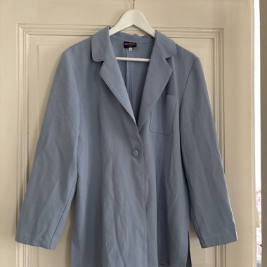 Blazer celeste con bottone