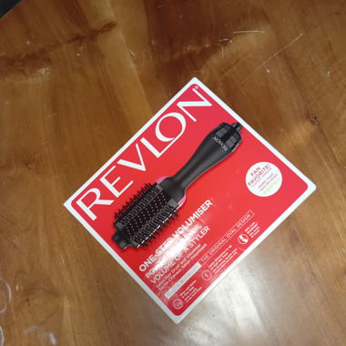 Heated blowdrying brush 