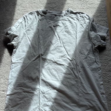 White Nike shirt