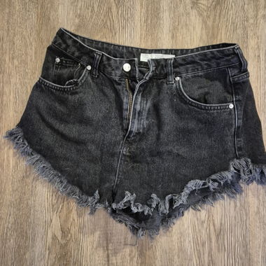 Black denim jean shorts with frayed hem