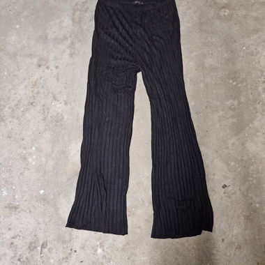 Pantaloni neri plissettati