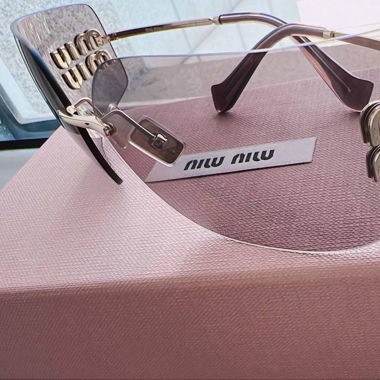 MIU MIU Sonnenbrille MU 54YS goldgelb