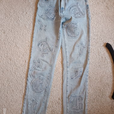 Light blue jeans with embroidery (letters BAC) 