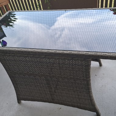 Rattan armchair set with glass table
