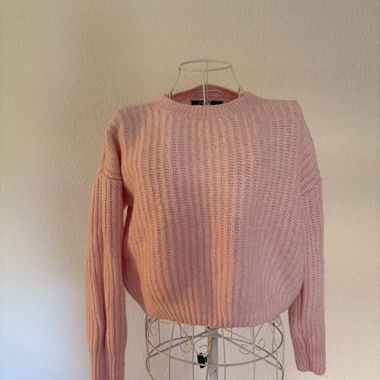 Pink knitted sweater