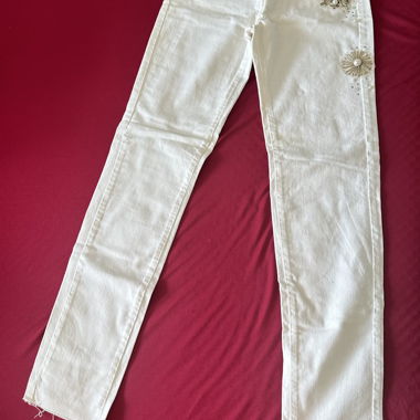 Edward Spiers white jeans with pearl flower detail