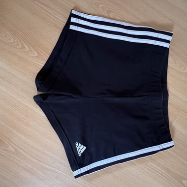 Black adidas shorts with white stripes