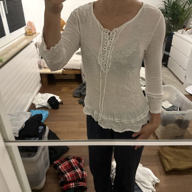 White ruffle blouse with lacing