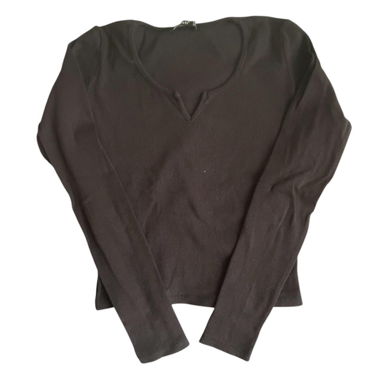brown shirt with a small slit