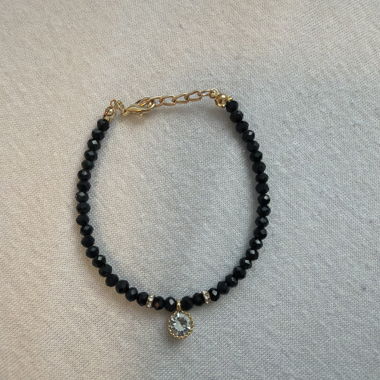 Bracciale di perle nere con ciondolo