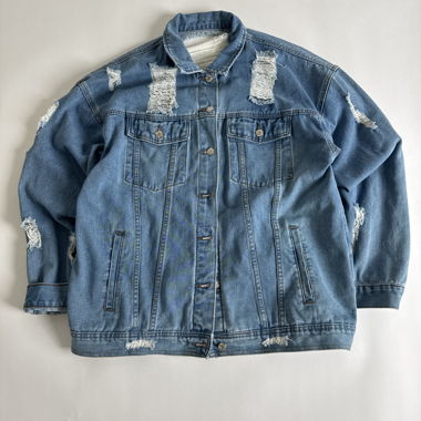 Giacca in denim distressed