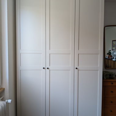 Light grey IKEA PAX wardrobe