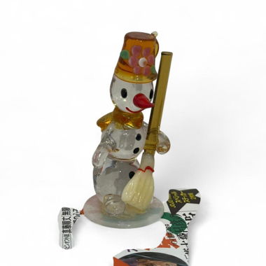 Glass snowman figurine with broom