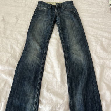 Aged denim jeans