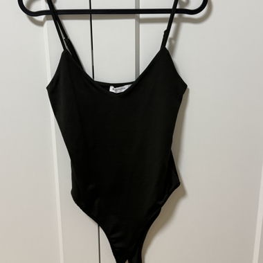 Black spaghetti-strap bodysuit