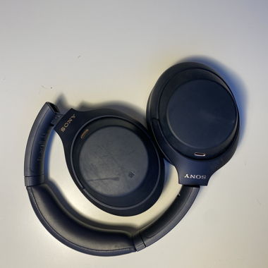 Sony WH-1000XM4 headphones in dark blue