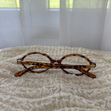 Monture de lunettes rétro à motif léopard et détails dorés