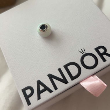 Holographic Pandora Charm