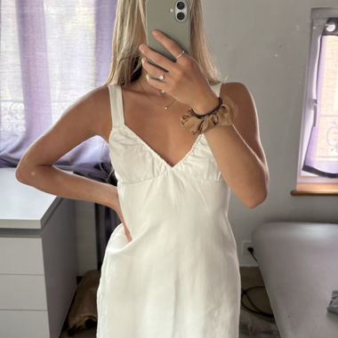 White sleeveless mini dress
