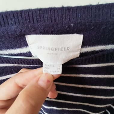 Pull rayé à effet chemisier en bas