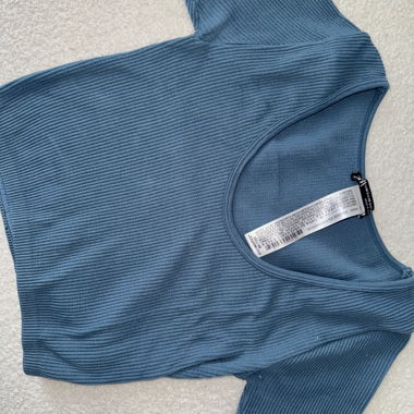 Top a costine blu