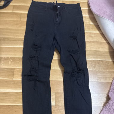 Black jeans with holes