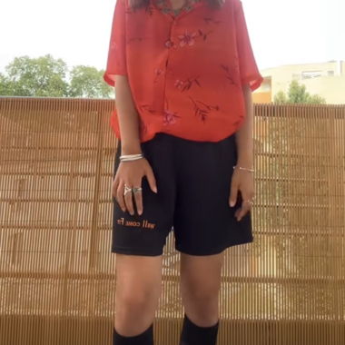 Orange BIAGGINI blouse with floral pattern