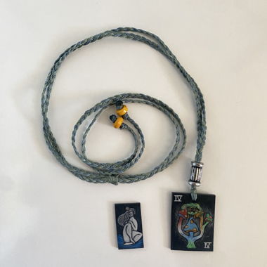 Cordon necklace with pendants