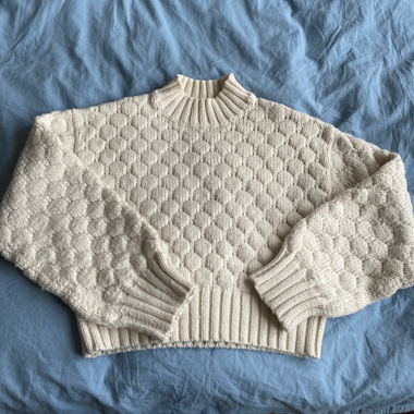 White knitted sweater