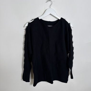 Top in maglia nero decorato