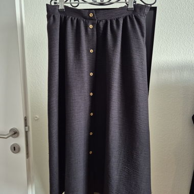 Black long skirt with "fake buttons"