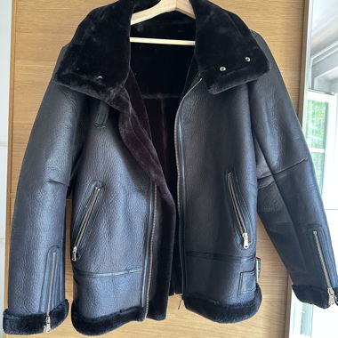 Veste noire fourrée teddy en similicuir