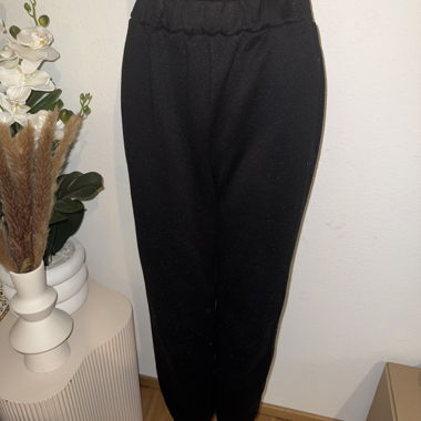 Black tracksuit bottoms with elasticated waist
