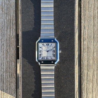 Montre-bracelet vintage (légèrement bleue)