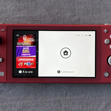 Nintendo Switch Lite pink and 2 games