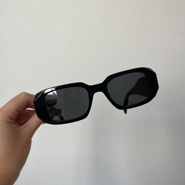 Lunettes de soleil Prada Symbole (noires)