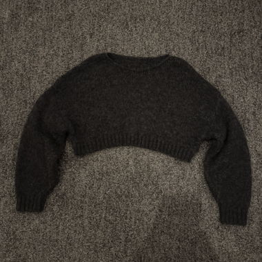Pull court noir en maille