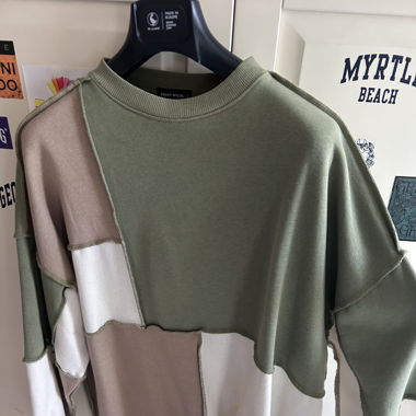 green, beige and white sweater