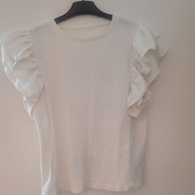 T-shirt bianco con balze