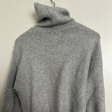 Pull col roulé